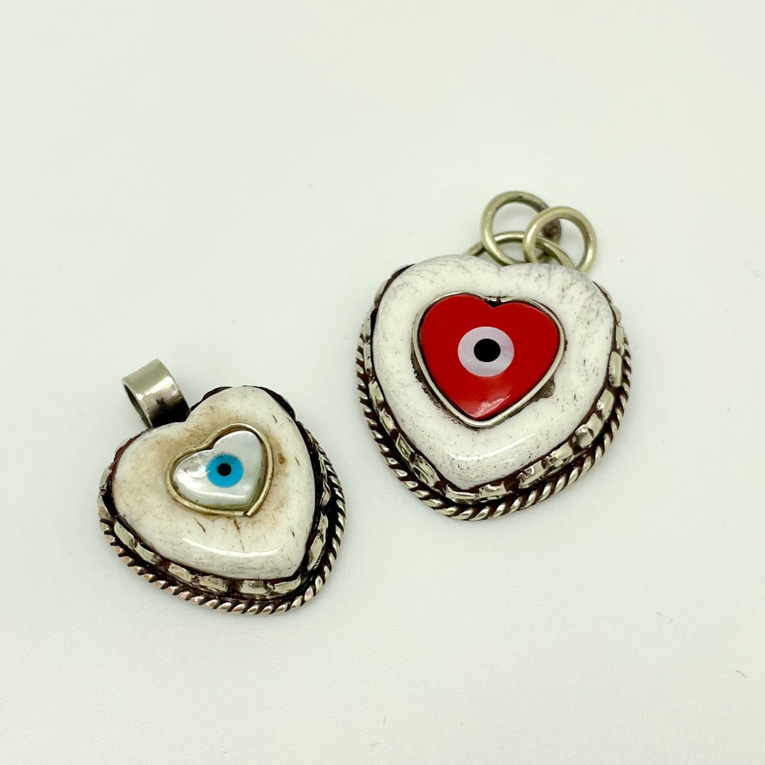 Brass Lined Heart Shaped Stone with Heart Shaped Evil Eye Pendant