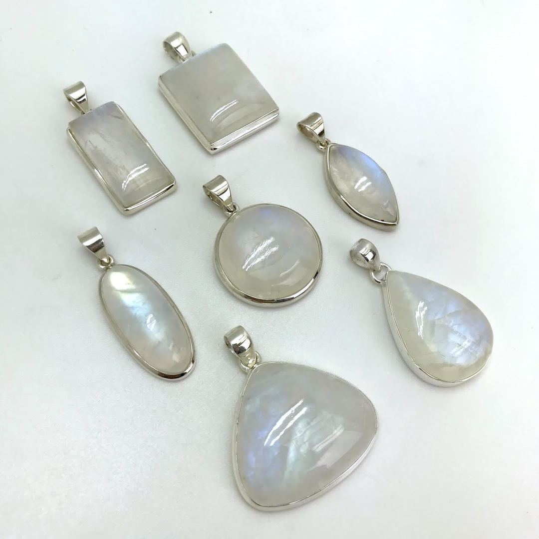 Polished Rainbow Moonstone Silver Pendant
