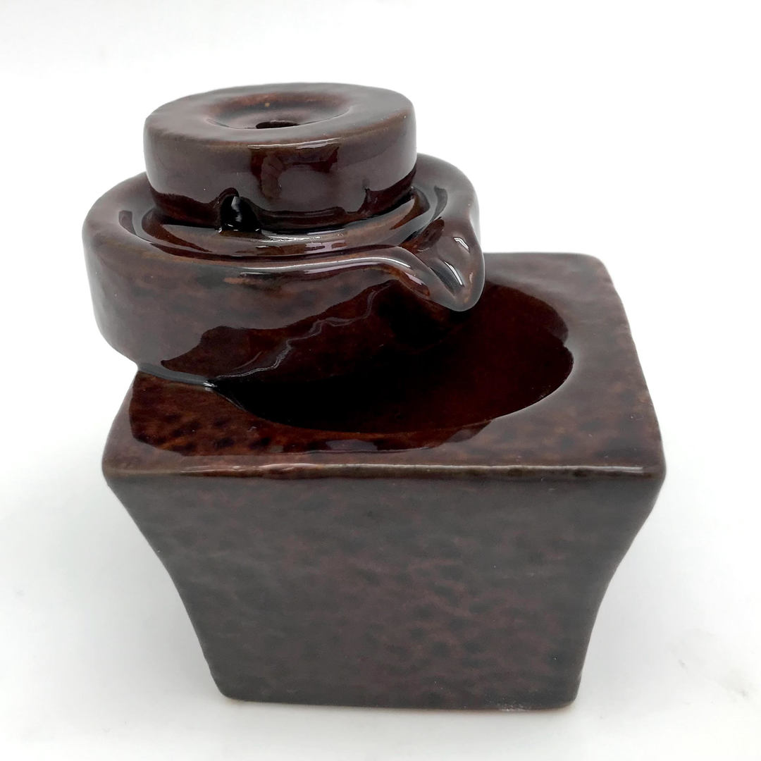 Small Geometric Backflow Burner