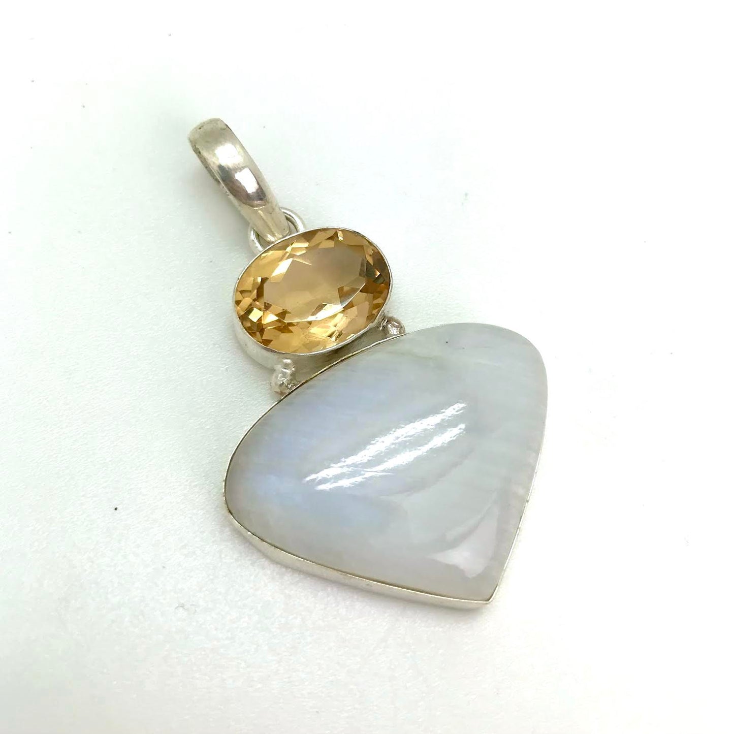 Polished Rainbow Moonstone And Faceted Topaz Silver Pendant