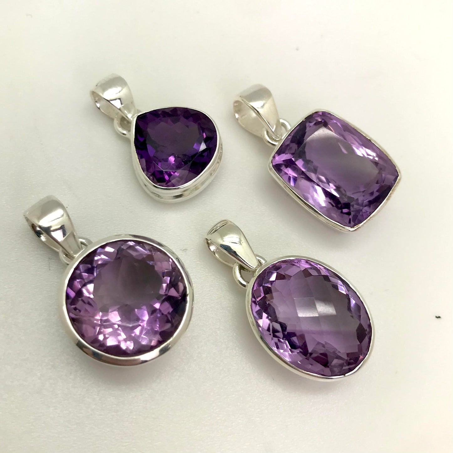 Silver Lined Faceted Amethyst Pendants