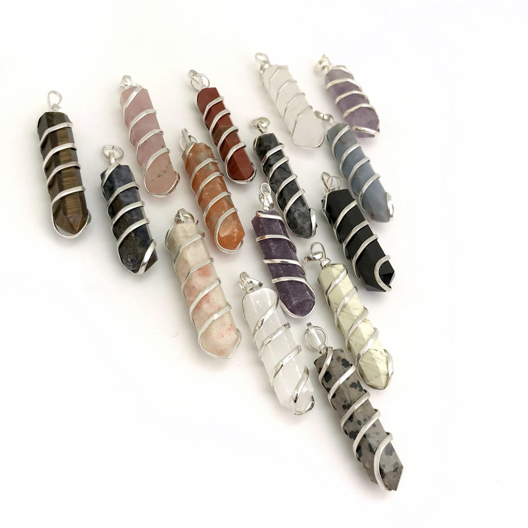 Silver Wrapped Crystal Point Pendant