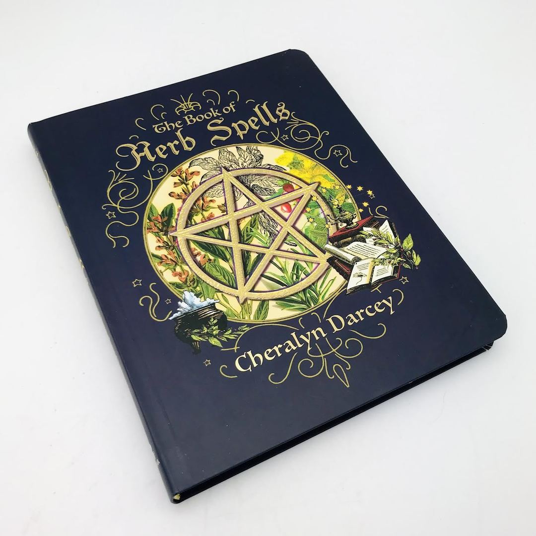 The Book Of Herb Spells by Cheralyn Darcey