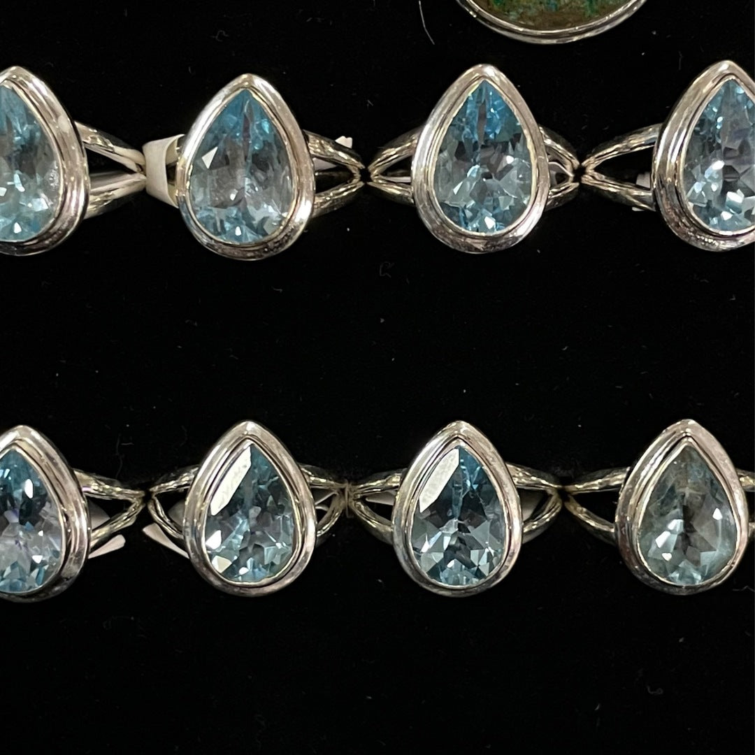 Blue Topaz Faceted Ring (Teardrop)