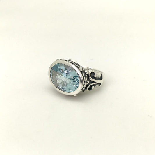 Faceted Oval Blue Topaz Ring Sterling Silver with Decorative Rim