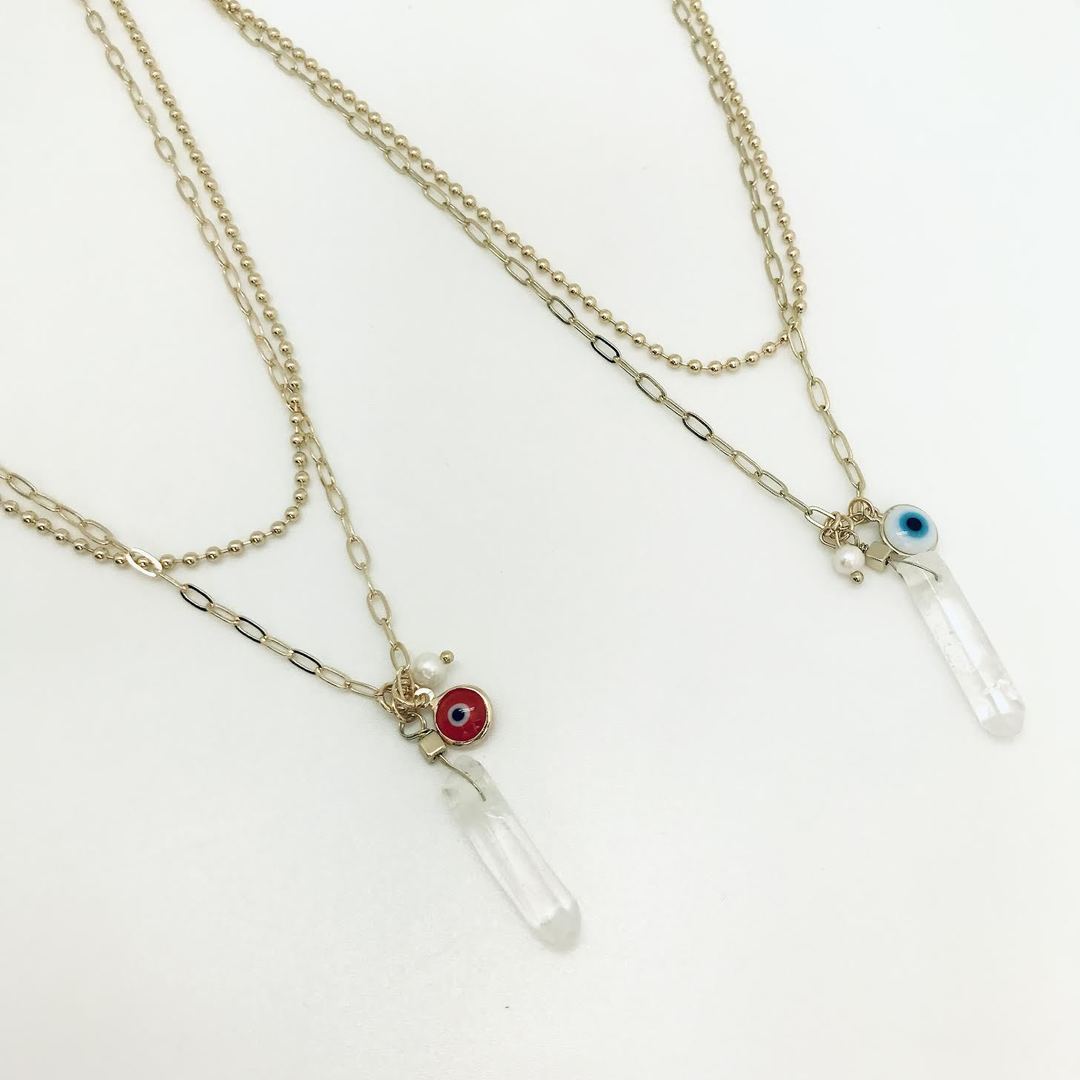 Isles & Stars - Double Layered Necklace with Evil Eye, Pearl Bead and Raw Quartz Charm