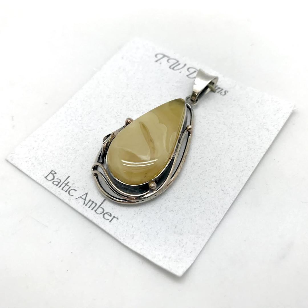 T.W. Baltic Amber with Silver Design Lining Pendant